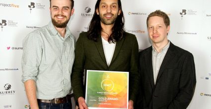 Watb team receiving an award